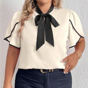 SHEIN Black and White Blouse with Elegant Design